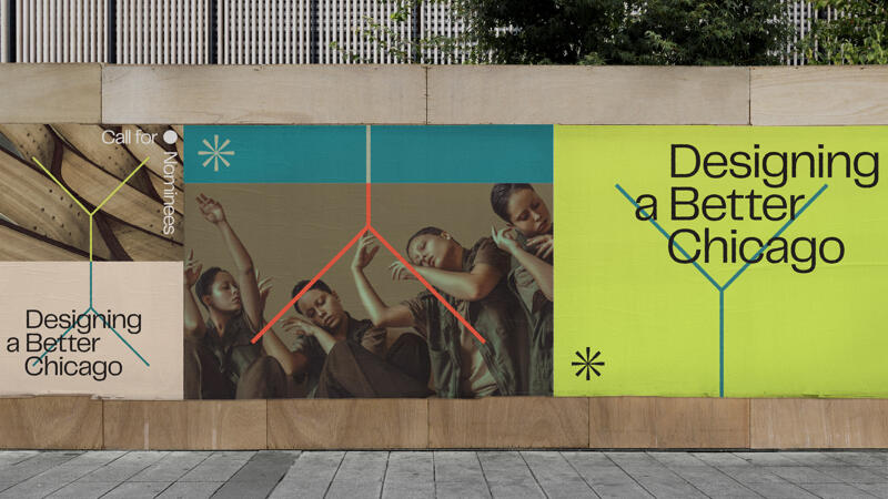 A series of oversized posters pasted onto on an urban wall