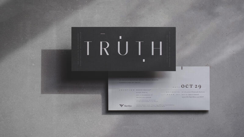 two Veritiv event invitations floating and shot from above, displaying the front and back